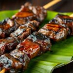 Sate Kambing Pak Darso Pengging, Warung Legendaris sejak 1955 Ilustrasi tusukan sate kambing bakar di atas daun pisang